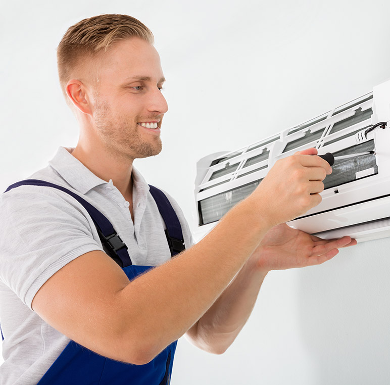 Man installing air conditioner